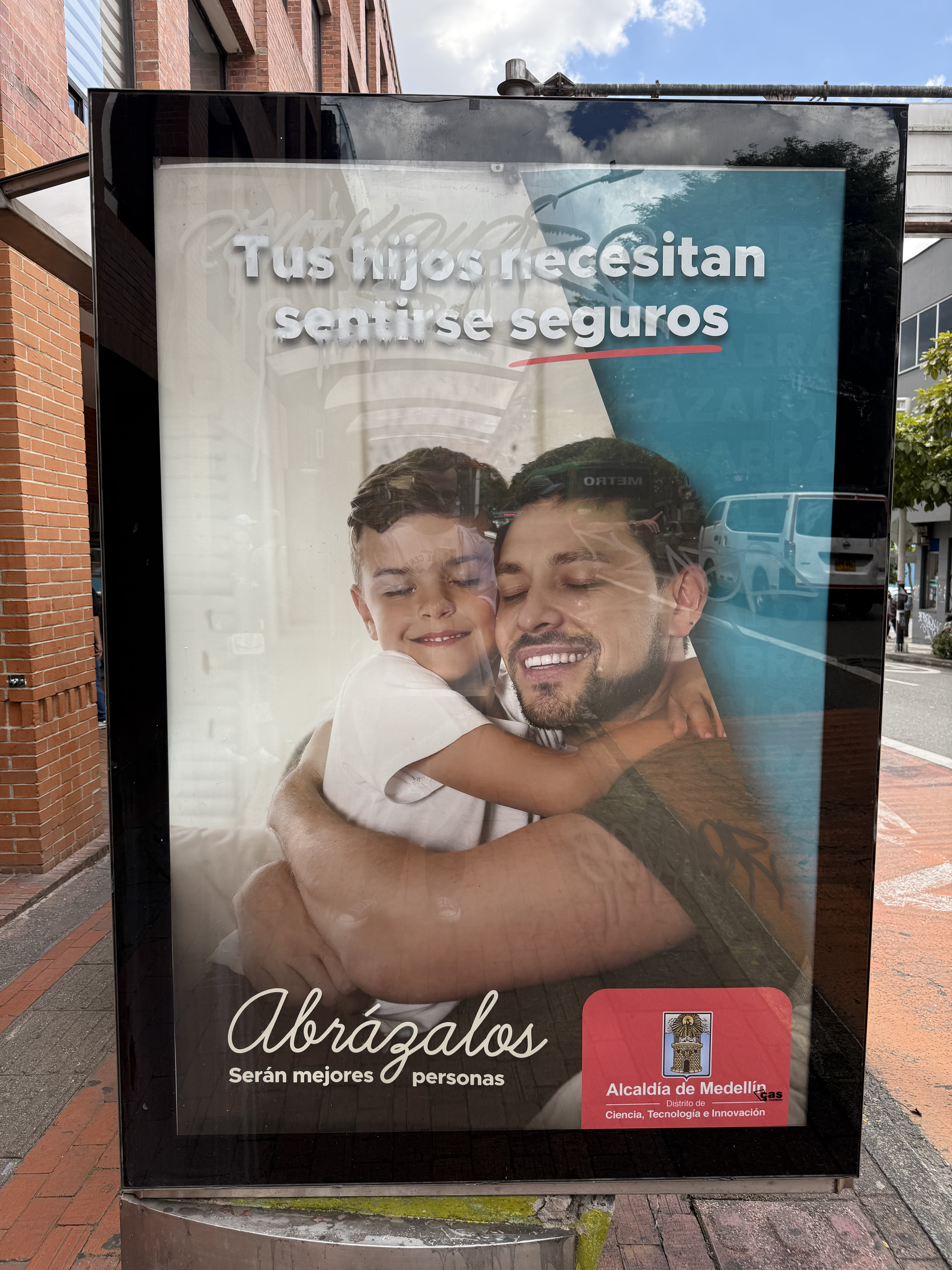 Bus stop poster in Medellín.